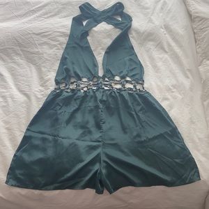 Green silky romper/playsuit with metal ring detail
